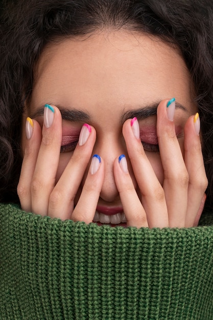 Close up smiley woman with pretty manicure