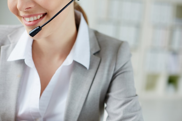 Close-up of smiling employee