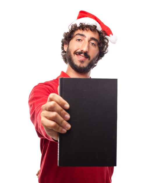 Close-up of smiling man with a black book