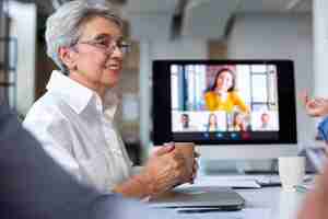 Free photo close up on smiling person in conference room