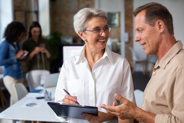 Free photo close up on smiling person in conference room