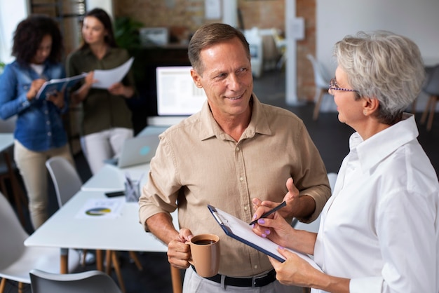 Free photo close up on smiling person in conference room