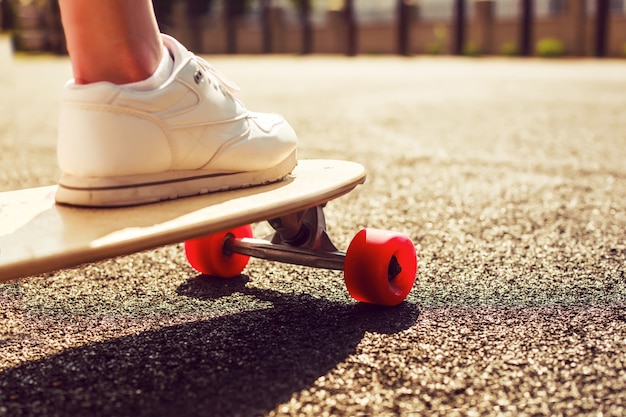 Close-up of sneaker on skateboard