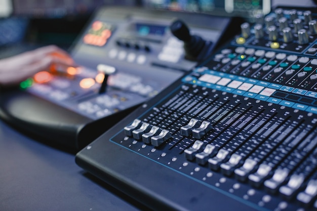 Free photo close up of sound engineer hands recording music