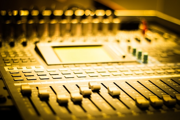 Close-up of sound mixer with buttons