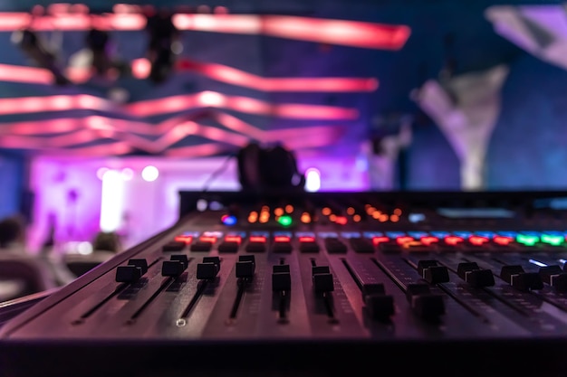 Close up sound music mixer control panel on blurred background