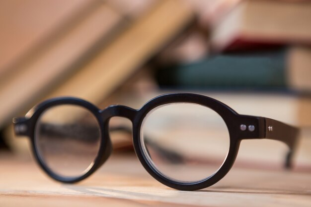 Close-up of spectacles on a table