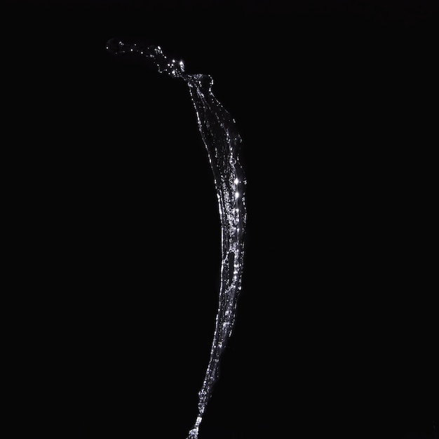 Close-up of a splashing water on black background