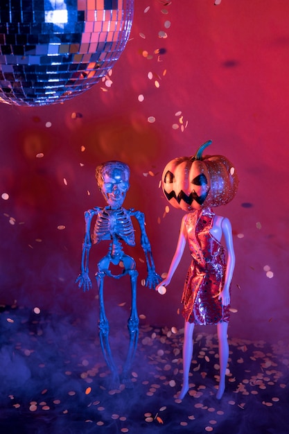 Close-up spooky halloween toys and disco ball