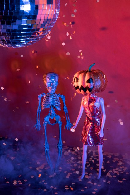 Close-up spooky halloween toys and disco ball