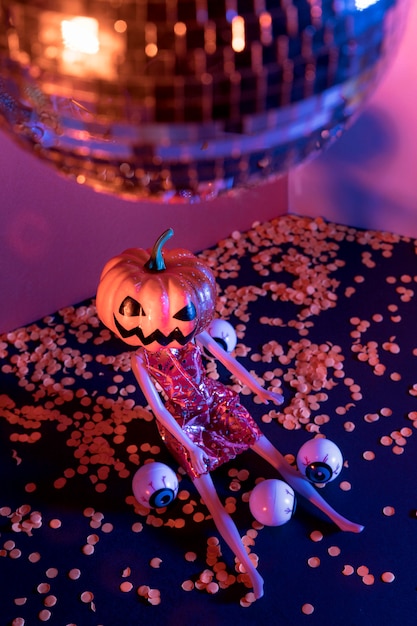 Close-up spooky halloween toys and disco ball