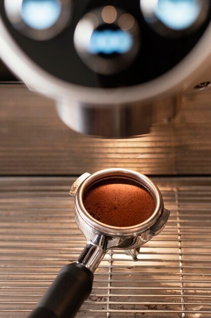 close up spoon holding coffee