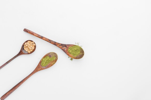 Close-up spoons with matcha tea powder