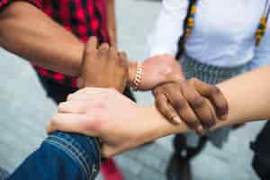 Free photo close-up of stacked hands