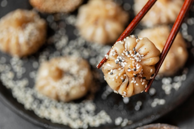 Free photo close-up sticks holding food