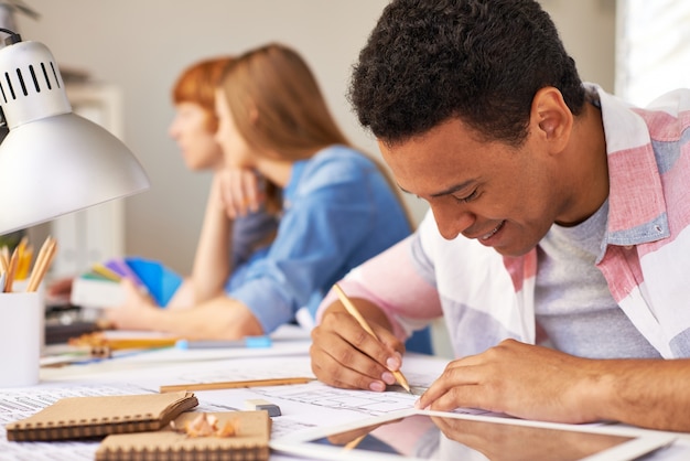 Close-up student with his homework