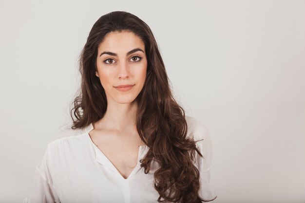 Close-up of stylish woman with long hair