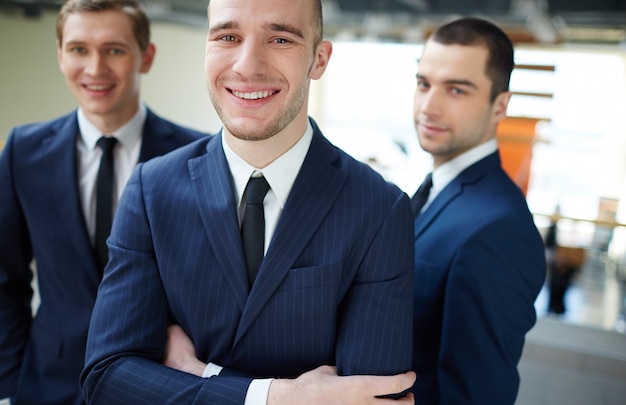 Close-up of successful businesspeople in office