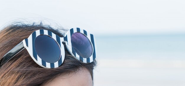 Close up sun glasses on head