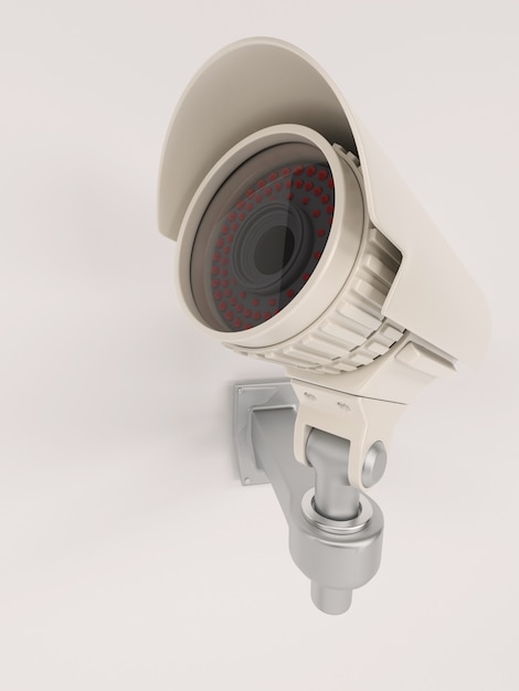 Close-up of surveillance camera on the wall