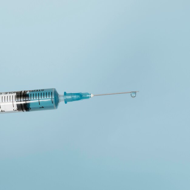 Close-up of syringe with vaccine