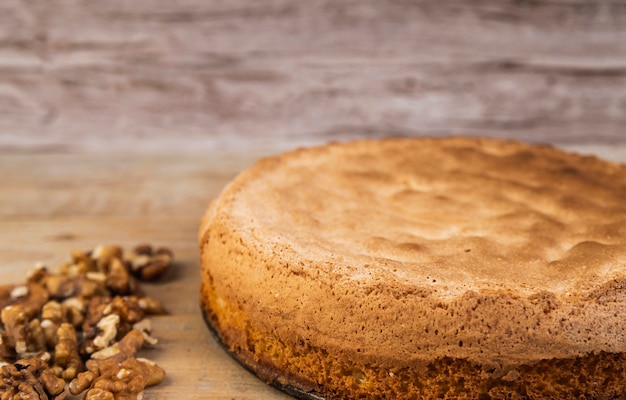 Close-up tasty cake with walnuts