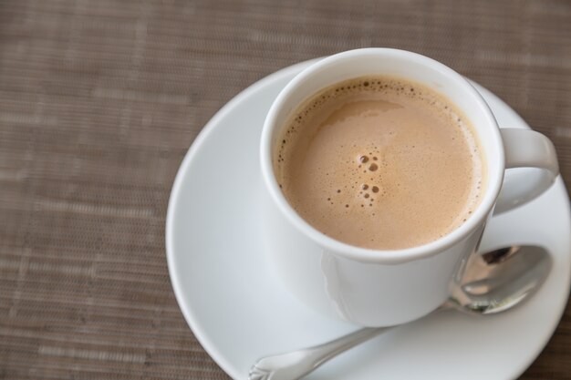 Close-up of tasty coffee with spoon