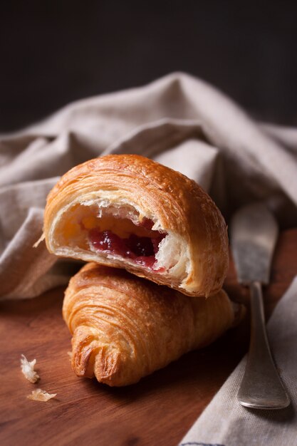 Close-up of tasty croissant with jam