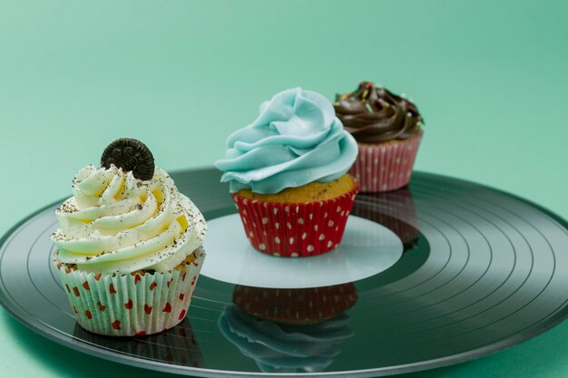 Close-up of tasty cupcakes with different toppings