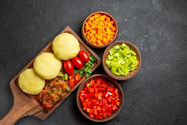 Close up on tasty cutlets chopped vegetables