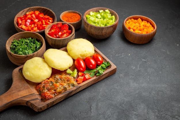 Close up on tasty cutlets chopped vegetables