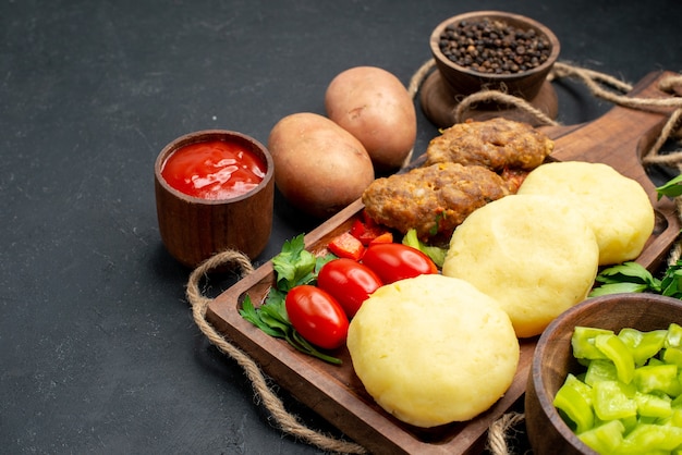 Close up on Tasty Cutlets with Chopped Vegetables