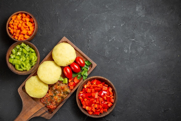 Close up on tasty cutlets chopped vegetables