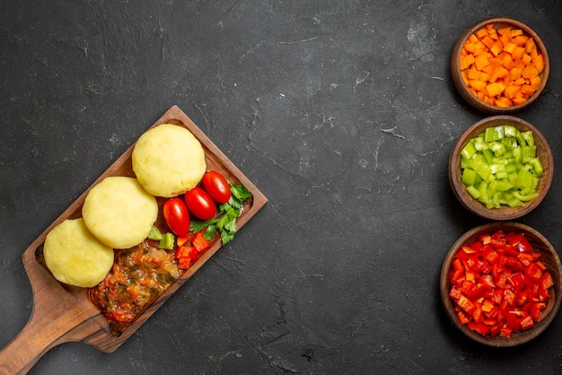 Close up on tasty cutlets chopped vegetables