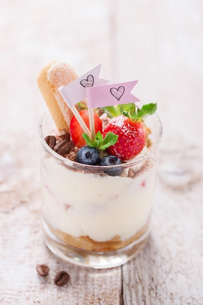 Close-up of tasty dessert with blueberries and strawberries