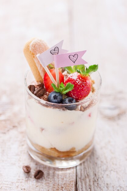 Close-up of tasty dessert with blueberries and strawberries