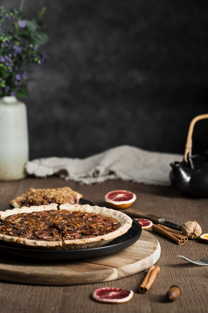 Close-up tasty handmade pecan pie on the table