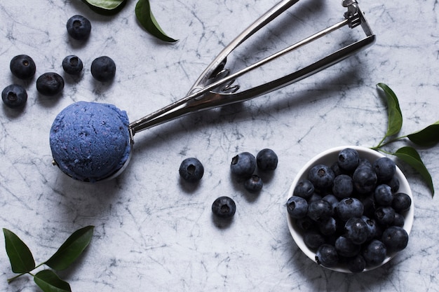 Close-up tasty ice cream scoop with berries