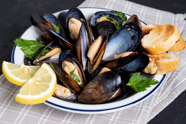 Close-up tasty mussels with lemon