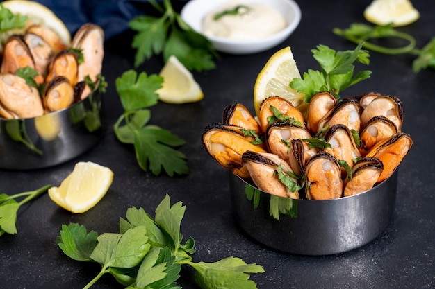 Close-up tasty mussels with parsley