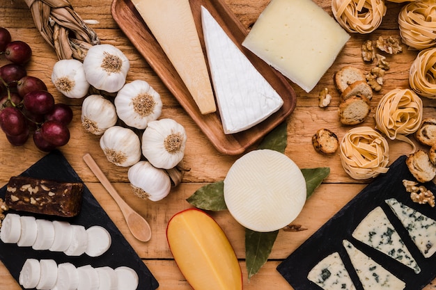 Close-up of tasty raw food over wooden table