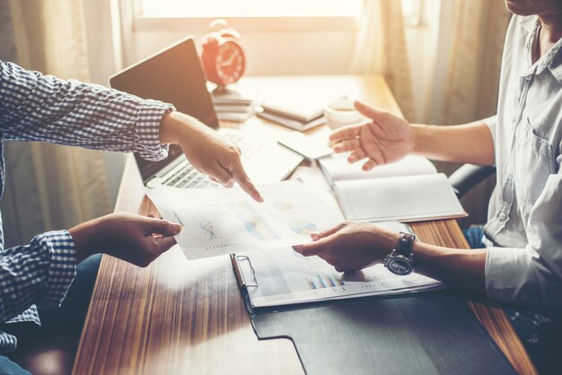 Close-up of  Team Business people discussing a financial plan at