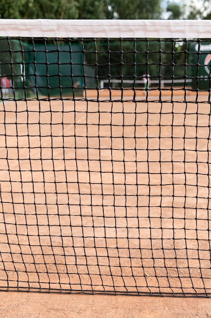 Close-up tennis net on court