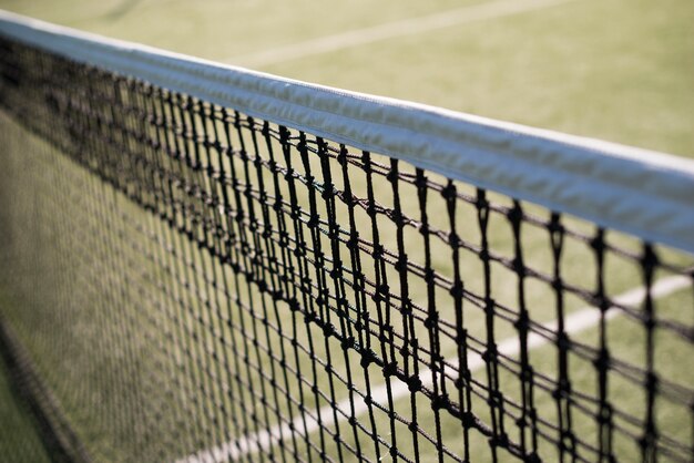 Close-up tennis net in a tennis court