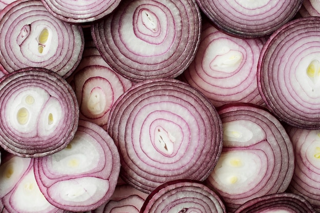 Close-up texture of red onion slices