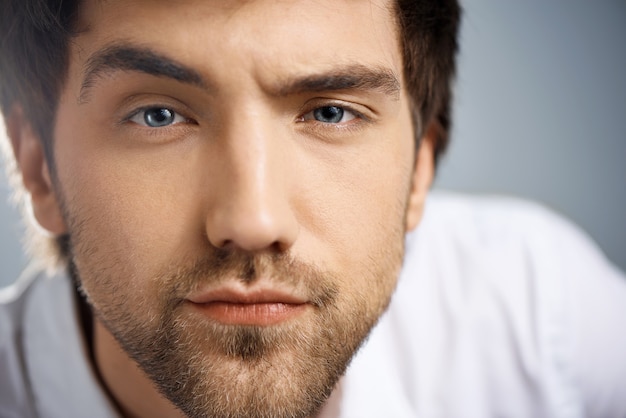 Close-up thoughtful smart man