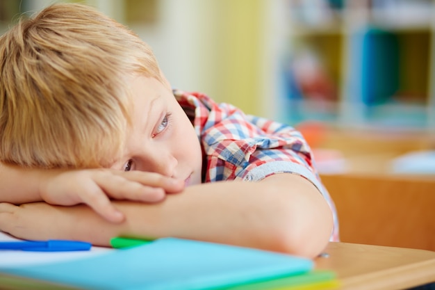 Free photo close-up of tired elementary student