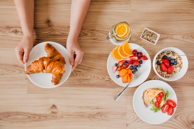 Close-up top view of person having breakfast