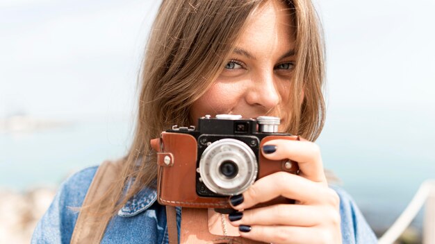 Close-up tourist taking photos