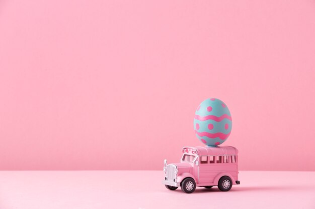 Close up on toy car with easter eggs